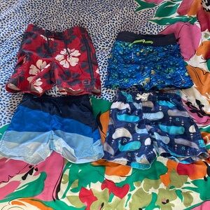 Old Navy, Circo, George boys swim trunks. Three size 2T, one size 18-24 months